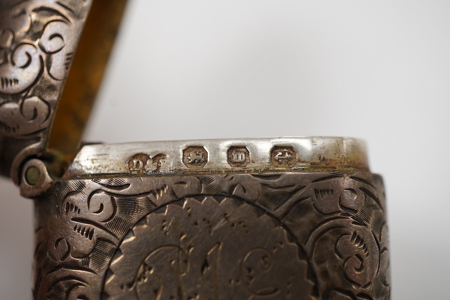 An early Victorian silver rectangular vinaigrette, with engraved chequered decoration, by William Simpson. Birmingham, 1836, 39mm, together with a late Victorian silver vesta case.